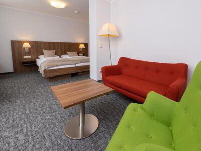 Doppelzimmer mit Sitzbereich Doppelzimmer mit Sitzbereich